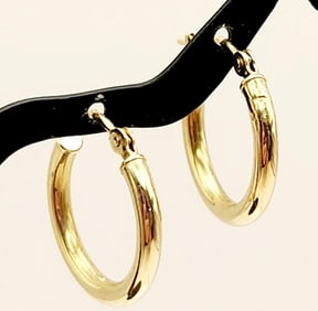 14K Yellow Gold Small Hoop Earrings Weighs 0.6 grams.