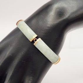 14K Yellow Gold & Green Jade Bracelet Bracelet is 7". Weighs 14.5 grams.