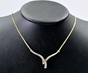 10K Yellow Gold 1/4 CTTW Diamond Necklace Necklace weighs 5.0 Grams Measures 16"