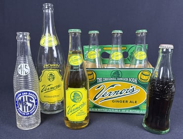 Soda Bottles Vernor’s Coke M & S Flint Michigan 7 bottles. 5 empty. 8 inches, 9 inches and 12