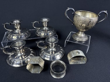 Mixed Lot Silverplate Candlesticks Napkin Rings Cup. Cup 4 x 5 inches. Candlesticks 2.5 x 4 inches.