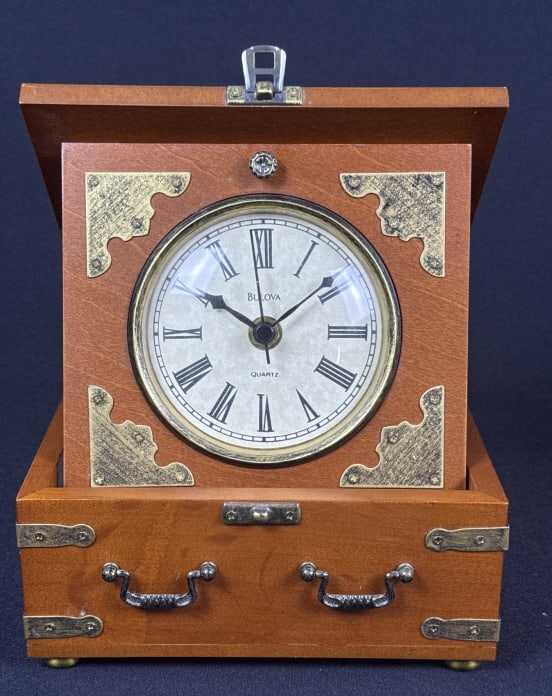Edinbridge Wooden Box Clock by Bulova 7.25 x 7.25 x 3.5 inches closed. Working condition. Cas win: 7.25 x 7.25 x 3.5 inches closed. Working condition. Cas win good condition