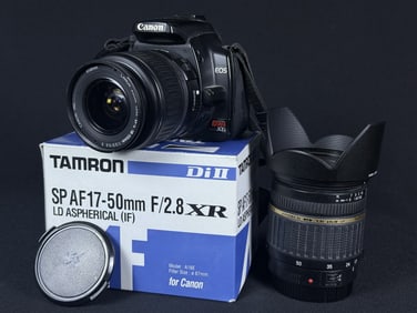 Canon Rebel XTI Digital SLR Camera 2 Lenses Includes body, Battery, Canon 18-55mm Lens, Tamron