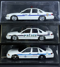 Chevrolet Caprice 1:18 Diecast Police Cars Cheyenne, Asheville and Chicago. With cases measuring 13