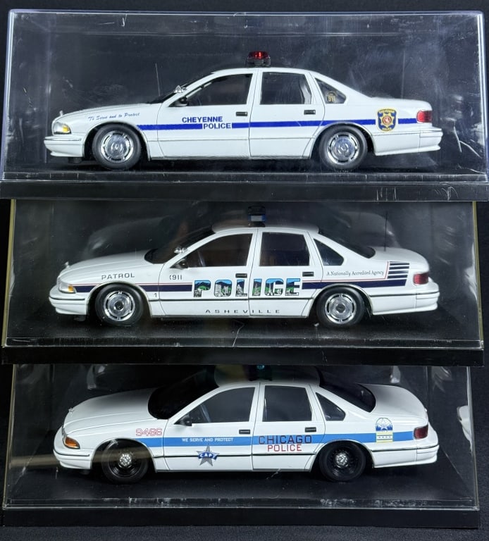 Chevrolet Caprice 1:18 Diecast Police Cars Cheyenne, Asheville and Chicago. With cases measuring 13: Cheyenne, Asheville and Chicago. With cases measuring 13 x 6.5 inches. Please refer to photos for condition information.
