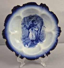 Vintage Flow Blue Serving Bowl Measures 10.5 x 2.5 inches tall. Some gold paint worn around rim.