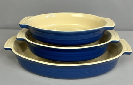 Le Creuset Stoneware Baking Dish Set 3pc Set includes one 3 3/5 qt. 14-inch dish, one 1 9/10 qt.