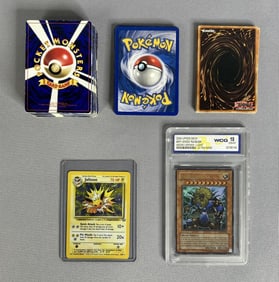 Pokemon Yu-Gi-Oh! 50+ Card Lot 1995-2004 Mystery Pokemon & Yu-Gi-Oh card lot.