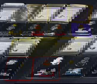 Johnny Lightning Collector’s Club Diecast Cars Tin Seven tin cases measuring 5 x 4 x 2 inches