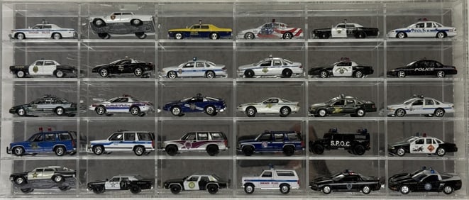 Diecast Police Cars Collection 1/64 Scale 30 cars in acrylic mirror backed case. 16 x 11 x 2.5