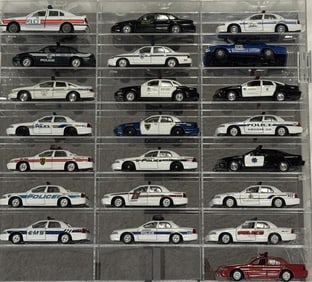 Diecast Police Cars Collection 1/43 Scale 22 cars in acrylic mirror backed case. Cars in good