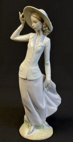Lladro Porcelain Figurine 5682 Breezy Afternoon 12 inches tall by 5 inches wide. Good condition free