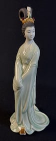 Vintage Porcelain Asian Woman Figurine 12 inches tall by 5 inches wide at base. Unsigned. Good