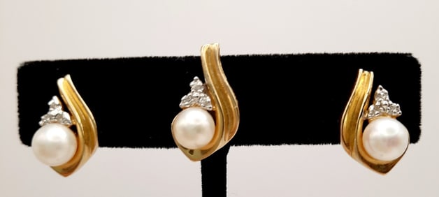 14K Yellow Gold Pearl Pendant & Earrings Set Backs are 14K. Lot weighs 6.3 grams.
