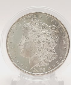 1879-S Morgan Silver Dollar Weighs 32.6 grams. Silver content is 90%.