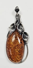 Vintage Baltic Amber Sterling Calla Lily Pendant Pendant weighs 28.7 Grams
