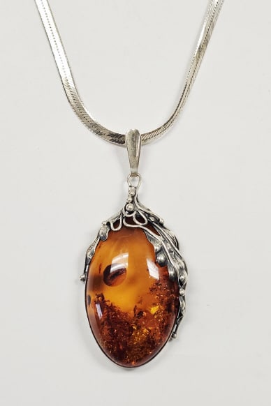 Sterling Silver Natural Amber Necklace Necklace weighs 35.1 Grams Measures 25": Necklace weighs 35.1 Grams Measures 25"