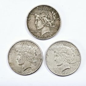 Three 1923 1926 1935 Peace Silver Dollar Coins See images regarding condition.