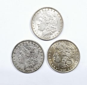 Three 1887 1889 1890 Morgan Silver Dollars See images regarding condition.