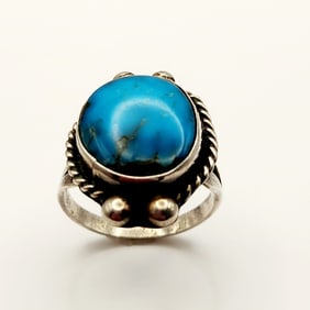 Vintage Sterling Turquoise Ring Size 7.25 Acid tests sterling. Lot weighs 7.9 grams