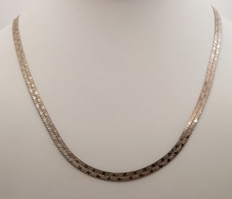 925 Vermeil Herringbone Chain Necklace Necklace is 20" Weighs 10.6 grams.