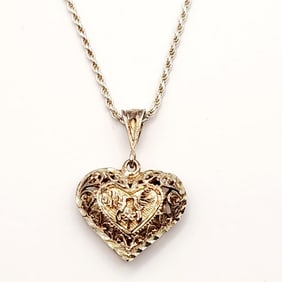 925 Sterling & Vermeil Love Birds Heart Pendant Necklace Necklace is 20". Weighs 10.8 grams.