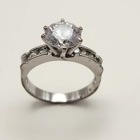 Sterling Cubic Zirconia Ring Size 6. Acid tests sterling. Weighs 3.1 grams.