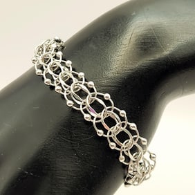 American Sterling Silver Chain Link Bracelet Bracelet is 7". Marked a American Weighs 11.9 grams.