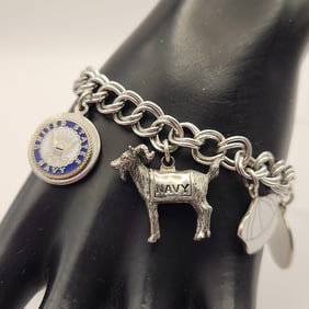 Silver Tone United States Navy Charm Bracelet Weighs 37.6 grams. Bracelet is 7".