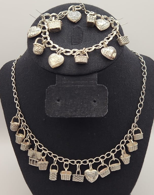 Sterling Brown County Baskets Charm Bracelet & Necklace Necklace is: Necklace Necklace is 22". Bracelet is 8". Lot weighs 61.8 grams.