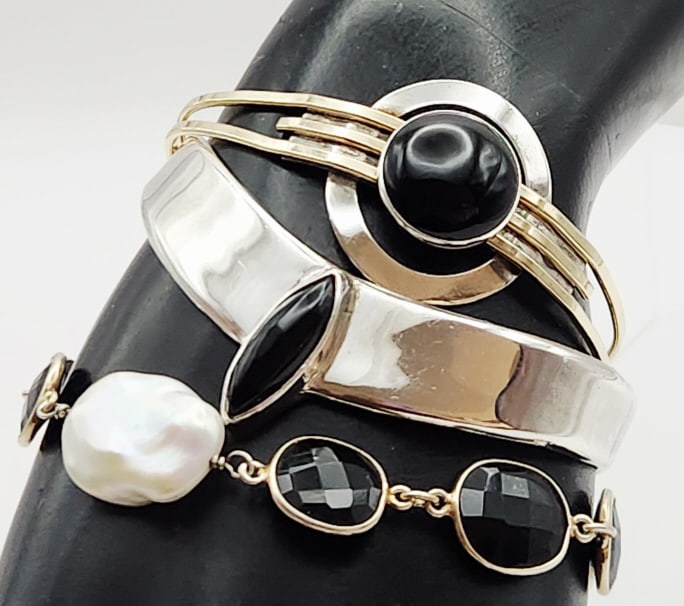 Lot of 3 Sterling & Vermeil Cuff Bracelets Onyx Mother-of-Pearl Lot weighs 50.1 grams.: Mother-of-Pearl Lot weighs 50.1 grams.