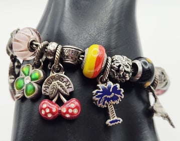 Silver Tone Bracelet & Assorted Silver Tone & Sterling Charms Weighs 83