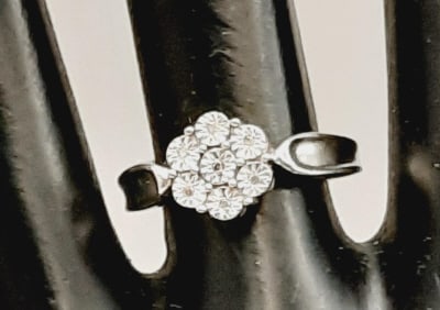925 Sterling Diamond Illusion Cluster Ring, Size 6.5. Weighs 3.1 grams.