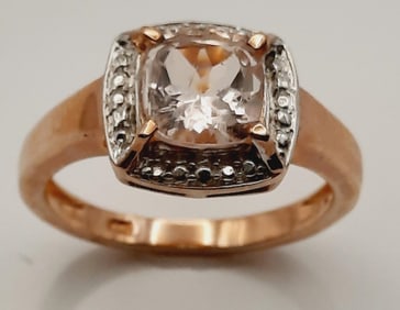Rose Tone Over 925 Sterling Cubic Zirconia Ring Size 7. Weighs 3.1 grams.