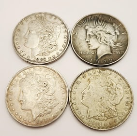 Lot of Morgan Silver Dollar & Peace Silver Dollars Lot weighs 103.9