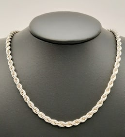 925 Sterling Twist Necklace Necklace is 16". Weighs 35 grams.