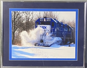 Train Photograph in Frame Photograph of a GMTX train engine in the snow. Photograph taken by Greg