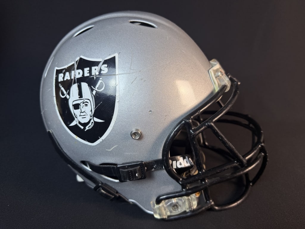 Vintage Riddell Raiders Full Size Football Helmet Size medium. Signs of heavy use over all.: Size medium. Signs of heavy use over all. Mannequin head not included.