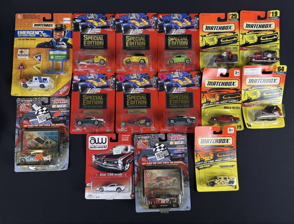 Matchbox Johnny Lightning 1:64 Scale Toy Cars Cars unopened on cards. Some warping and other signs: Cars unopened on cards. Some warping and other signs of age on cards. See photos for included items and condition details. 14 x 10 x 4 inches total