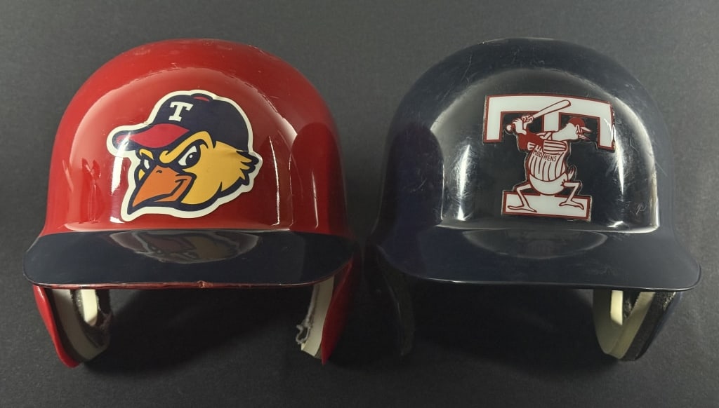 Toledo Mud Hens Batting Helmets Size 7 1/8 and 7 1/4. Signs of age and wear overall. See photos for: Size 7 1/8 and 7 1/4. Signs of age and wear overall. See photos for details. Approximately 12 x 8 x 8 inches