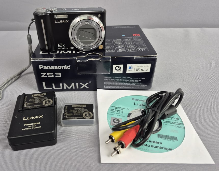 Panasonic LUMIX DMC-ZS3 Digital Camera Accessories & Box: Accessories & Box Powers on, otherwise untested. Scratches on screen. Please see images for details regarding the condition.