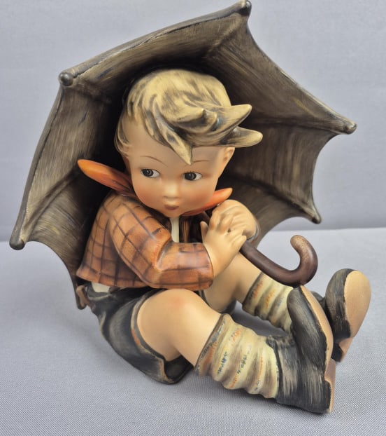 Vintage Goebel Hummel 8" Umbrella Boy Figurine No chips or cracks. Please see images for details: No chips or cracks. Please see images for details regarding the condition.