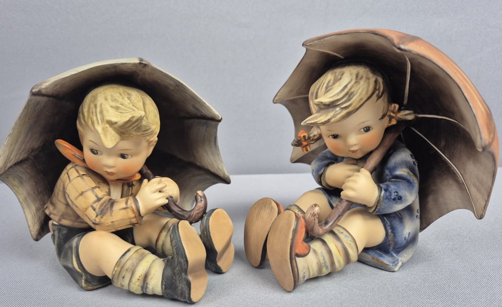 Goebel Hummel 5" Umbrella Boy & Girl Figurines No chips or cracks. Please see images for details: No chips or cracks. Please see images for details regarding the condition.