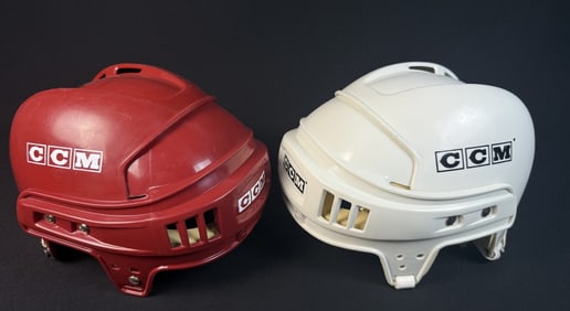 CCM Hockey Helmets Made in Canada. Red one is missing some padding and chin strap. Padding starting