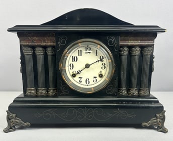 Antique Wooden Mantle Clock Click is overwound and there is no key included. Measures 16 x 5.5 x