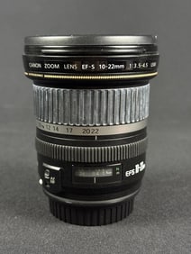 Canon EF-S 10-22mm F/3.5-4.5 USM SLR Lens With front and rear caps. Some discoloration on rubber