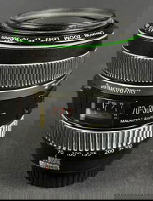 Canon EF 70-300mm F4.5-5.6 DO IS USM Lens Includes rear cap. Front cap missing. Includes ET-65B lens