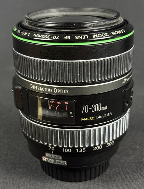 Canon EF 70-300mm F4.5-5.6 DO IS USM Lens Includes rear cap. Front cap missing. Includes ET-65B lens: Includes rear cap. Front cap missing. Includes ET-65B lens Hood. Untested. 4.5 x 3.5 inches.