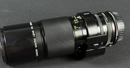 Canon Macro Lens FD 200mm F4 With EOS Adapter With lens caps. Untested. 8.5 x 2.5 inches.