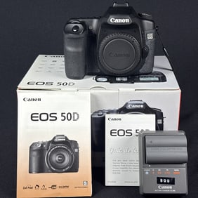 Canon 50D Body With Battery & Charger Powers on, otherwise untested. Shuttercount unknown. With